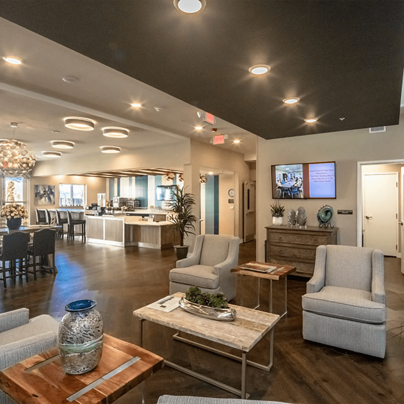 Resident lounge area with seating and coffee table at The Views at Lake Havasu in Lake Havasu City, Arizona