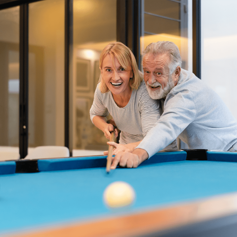 Residents playing pool at The Views at Lake Havasu in Lake Havasu City, Arizona