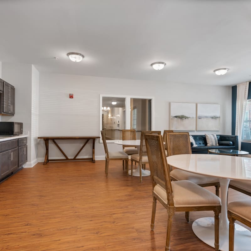 Model living space with lots of wall art at Indigo Ridge in New Bern, North Carolina