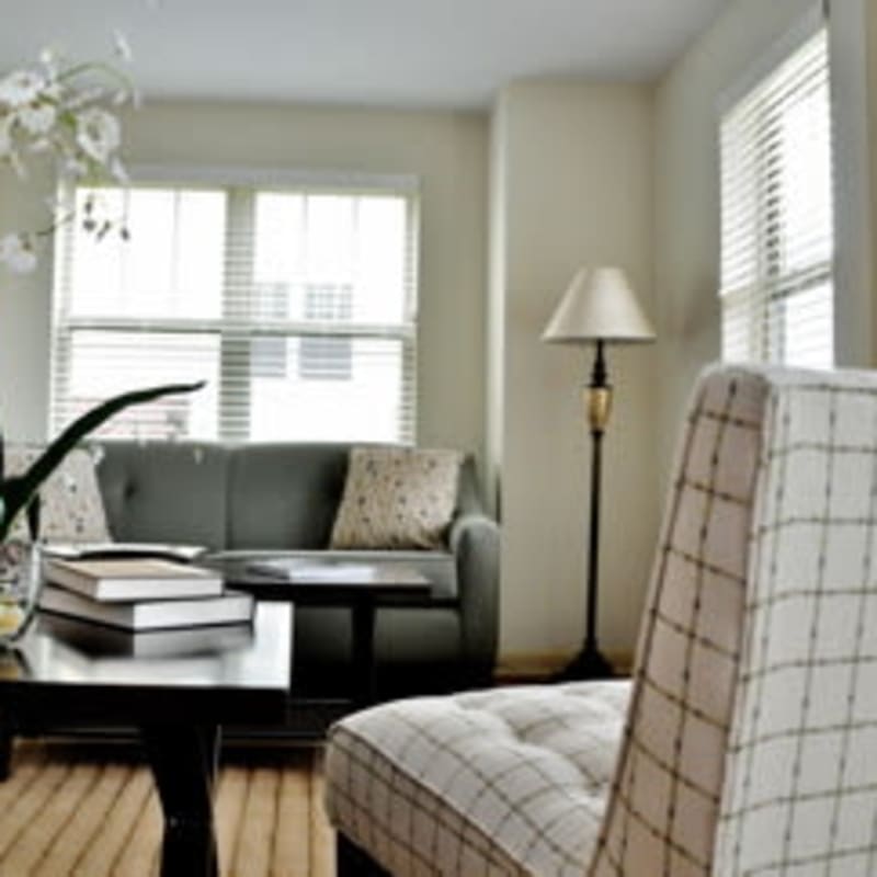 Model living space with white accents at Park Terrace in High Point, North Carolina