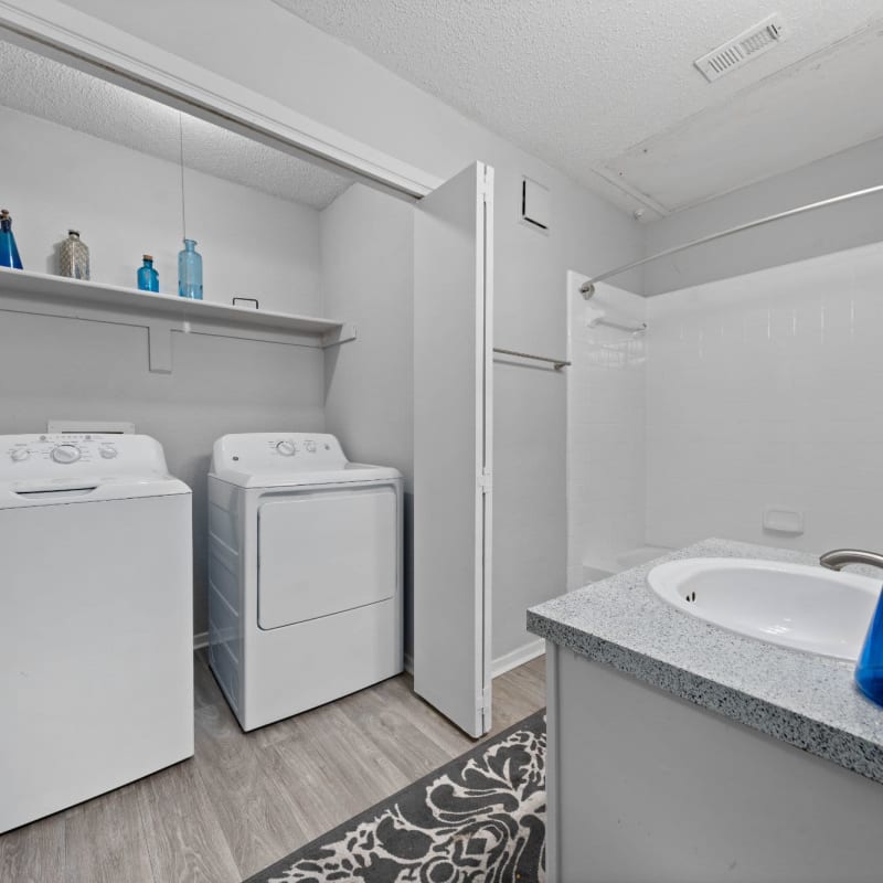 Laundry room at Ronan Apartment Homes in Grand Prairie, Texas