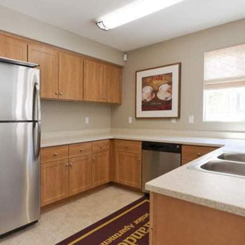 Kitchen with stainless-steel fridge at Mirandela in Rancho Palos Verdes, California