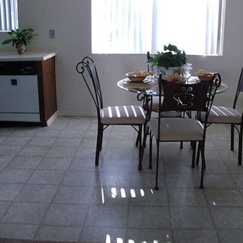 Dinning room with table at Foothill Courtyard Apartments in Vista, California