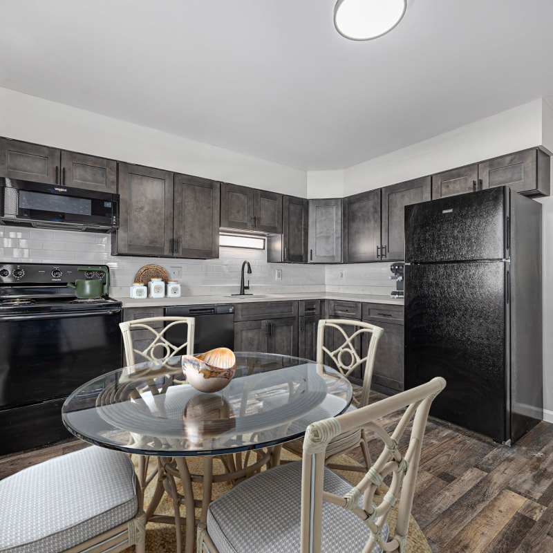 Well-equipped kitchen and cozy dining space at Eden Green Townhomes in Columbus, Ohio