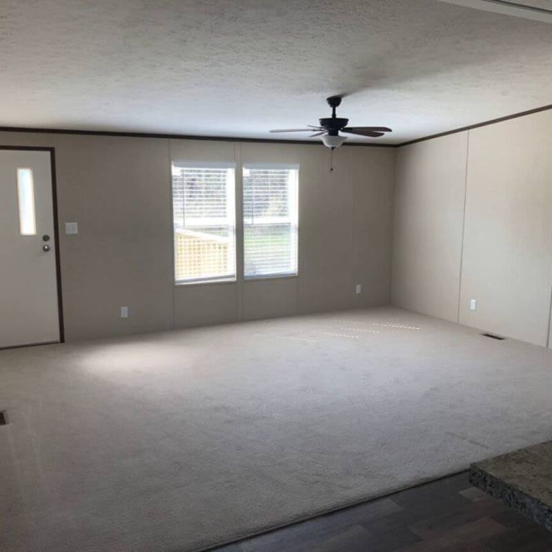 Well-lit living room at IC Creek Ranch in Leonard, Texas