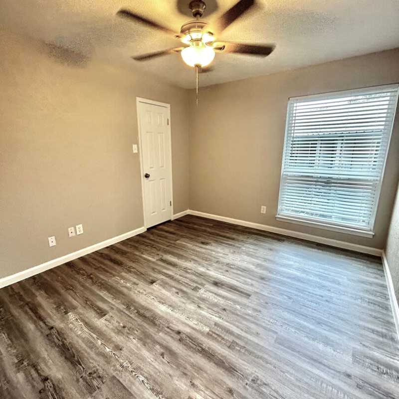 Bright room with window at Troup Townhomes in Troup, Texas