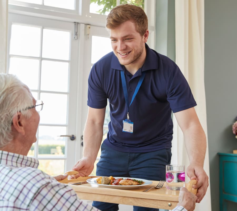 Caregiver and resident at MacArthur Hills in Irving, Texas