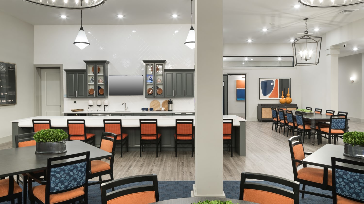 Community dining area at our active adult living apartments in Lakewood, CO, featuring dining tables and ample seating. 