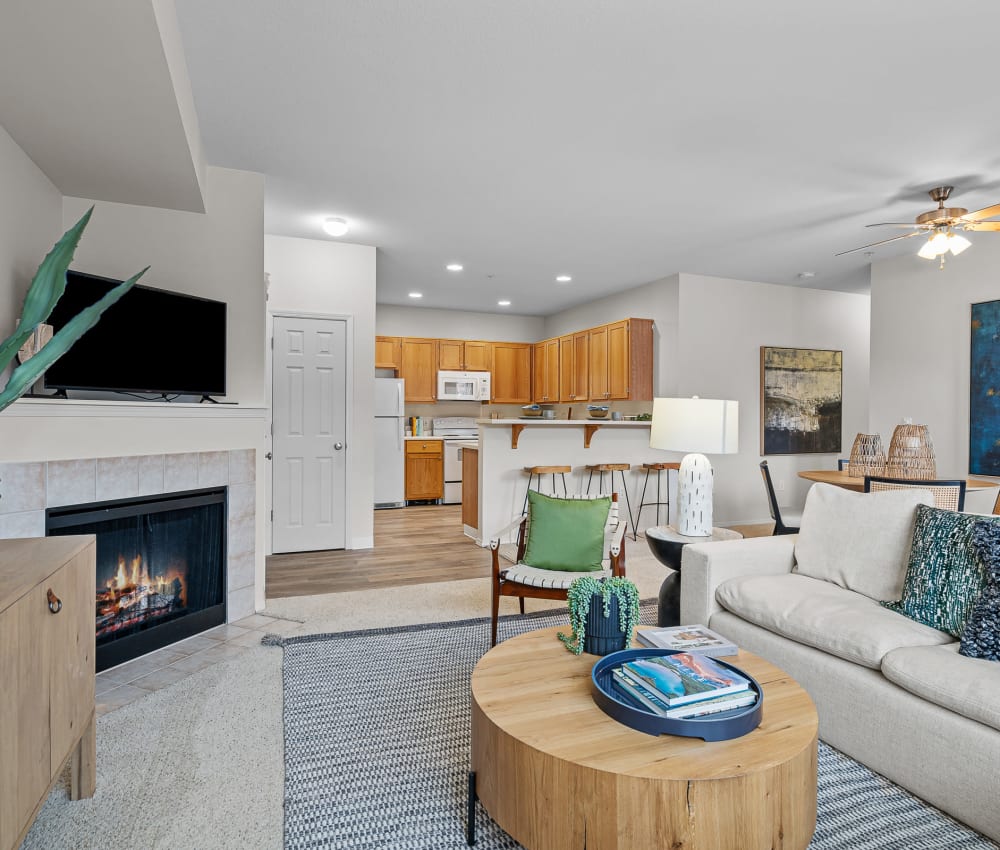 Living room with fireplace at Avery at Orenco Station in Hillsboro, Oregon