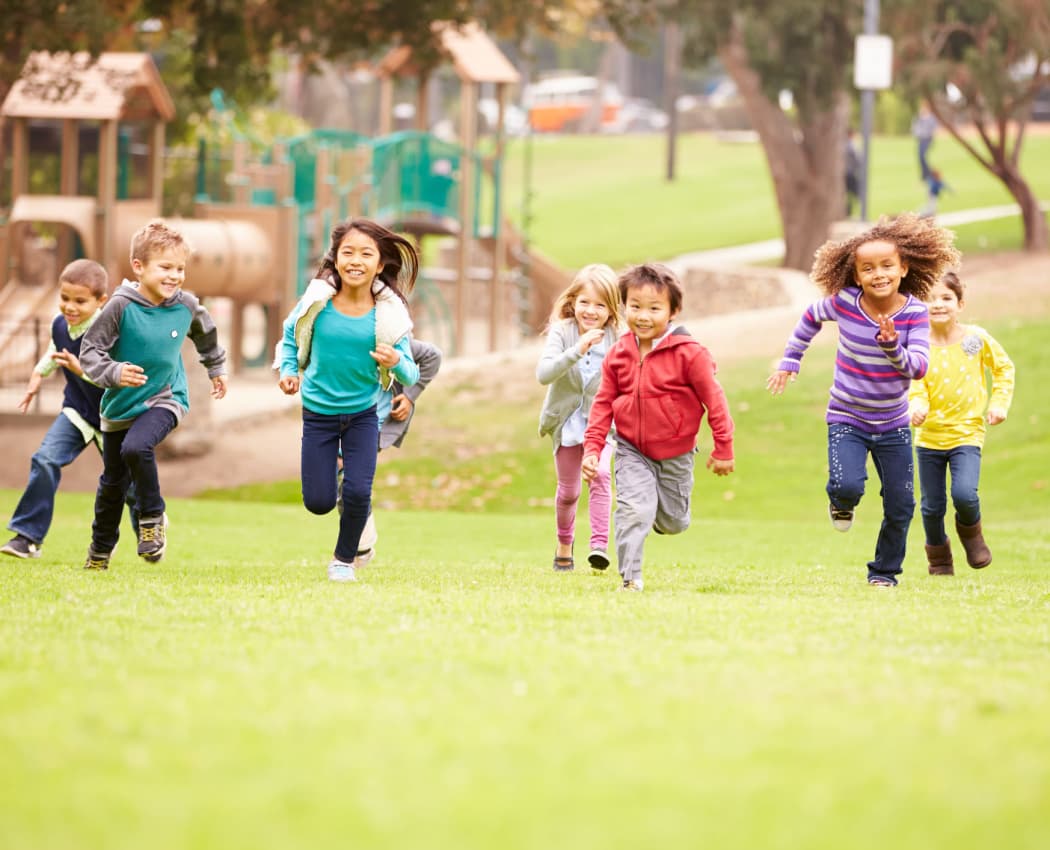 Children running near President Village in Fall River, Massachusetts