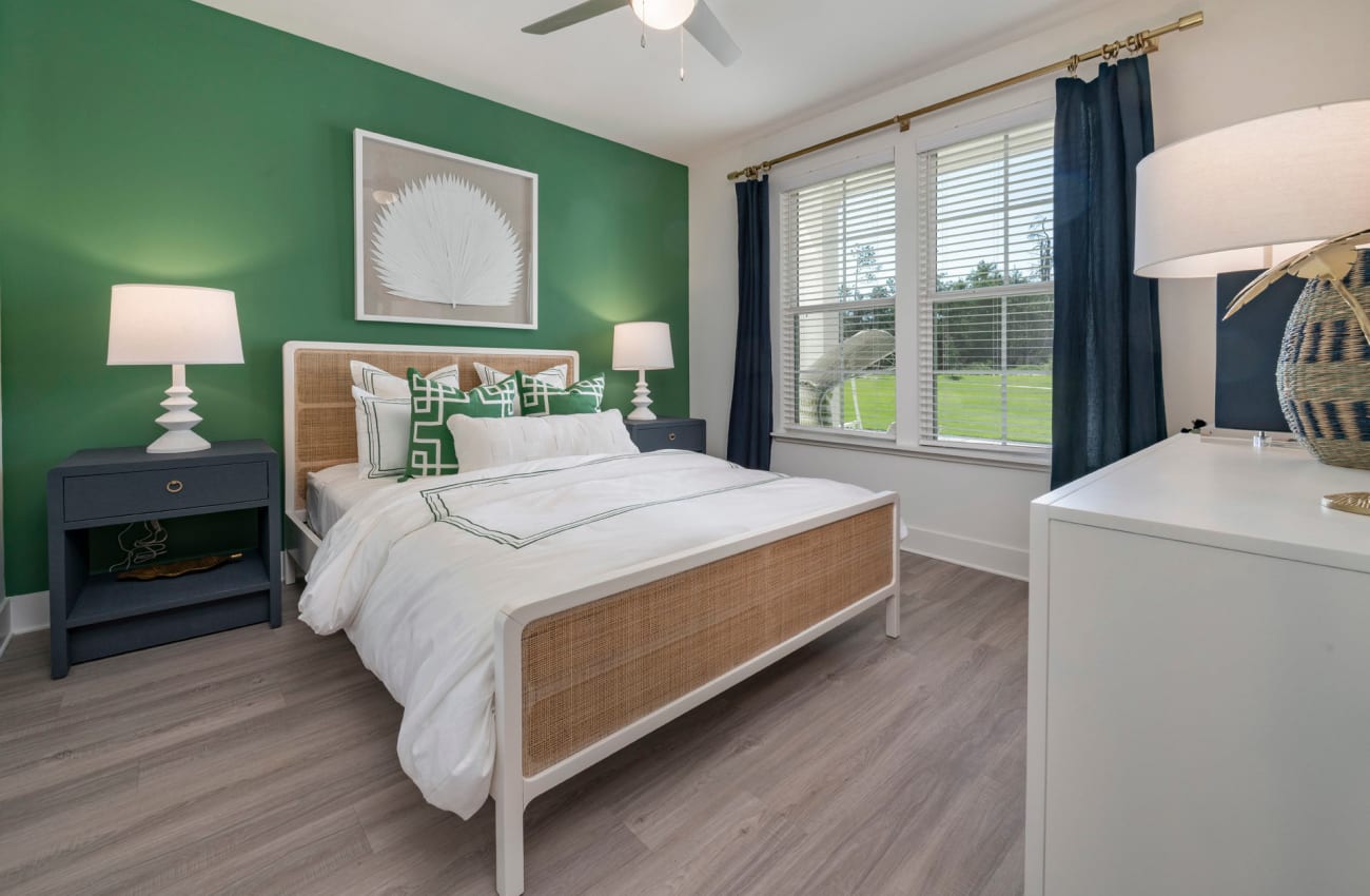Ponte Vedra FL Apartments - Cadence at Nocatee - Spacious Bedroom with Wood-Style Flooring