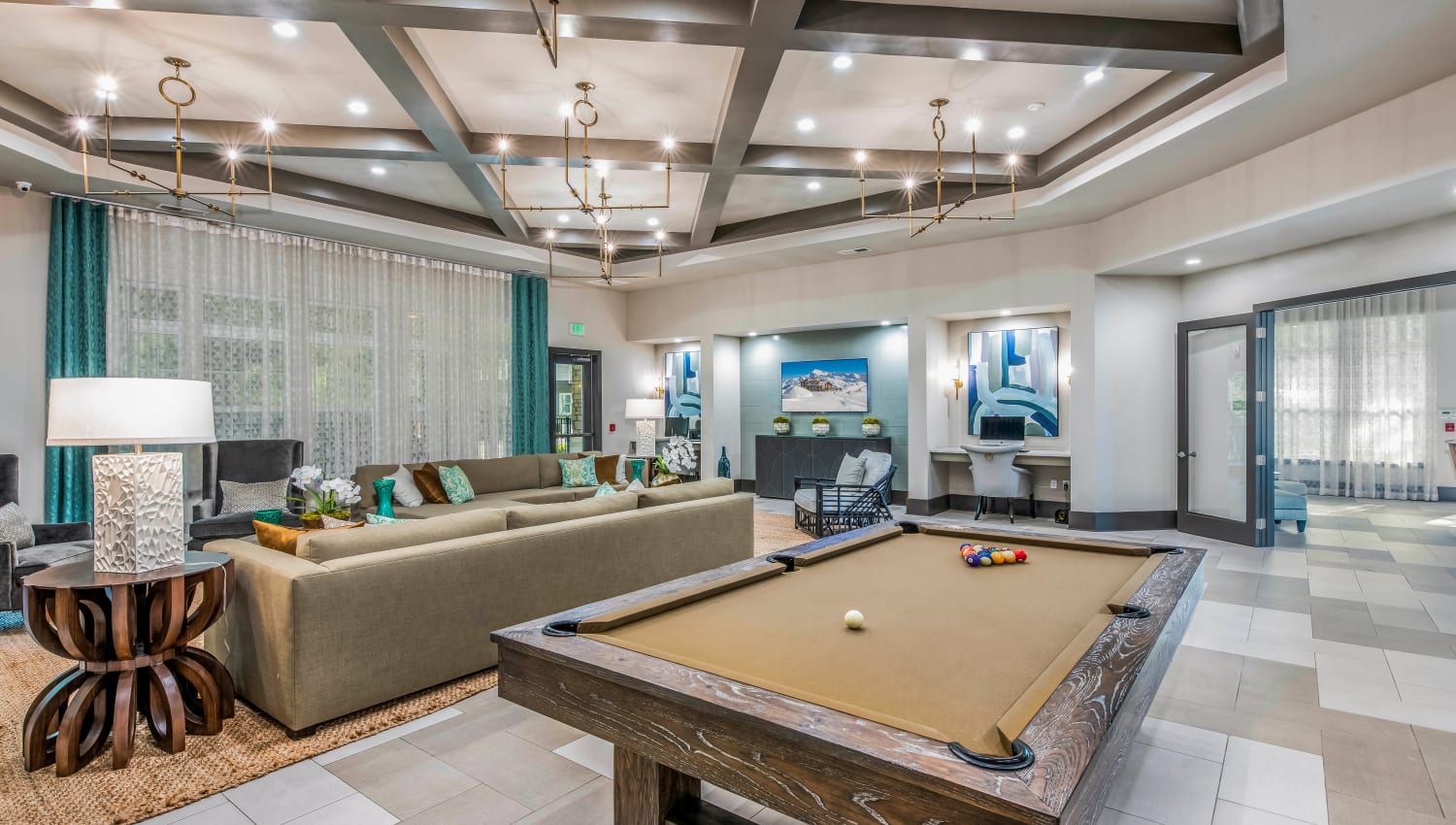 Billiards table and more in the game room at Canopy at Citrus Park in Tampa, Florida