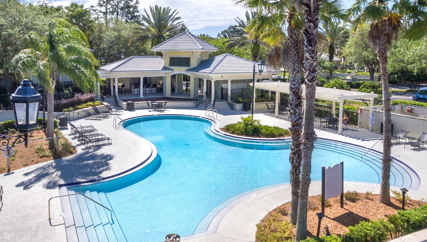 View of the pool area from the upper floor in the clubhouse at Cape House in Jacksonville, Florida