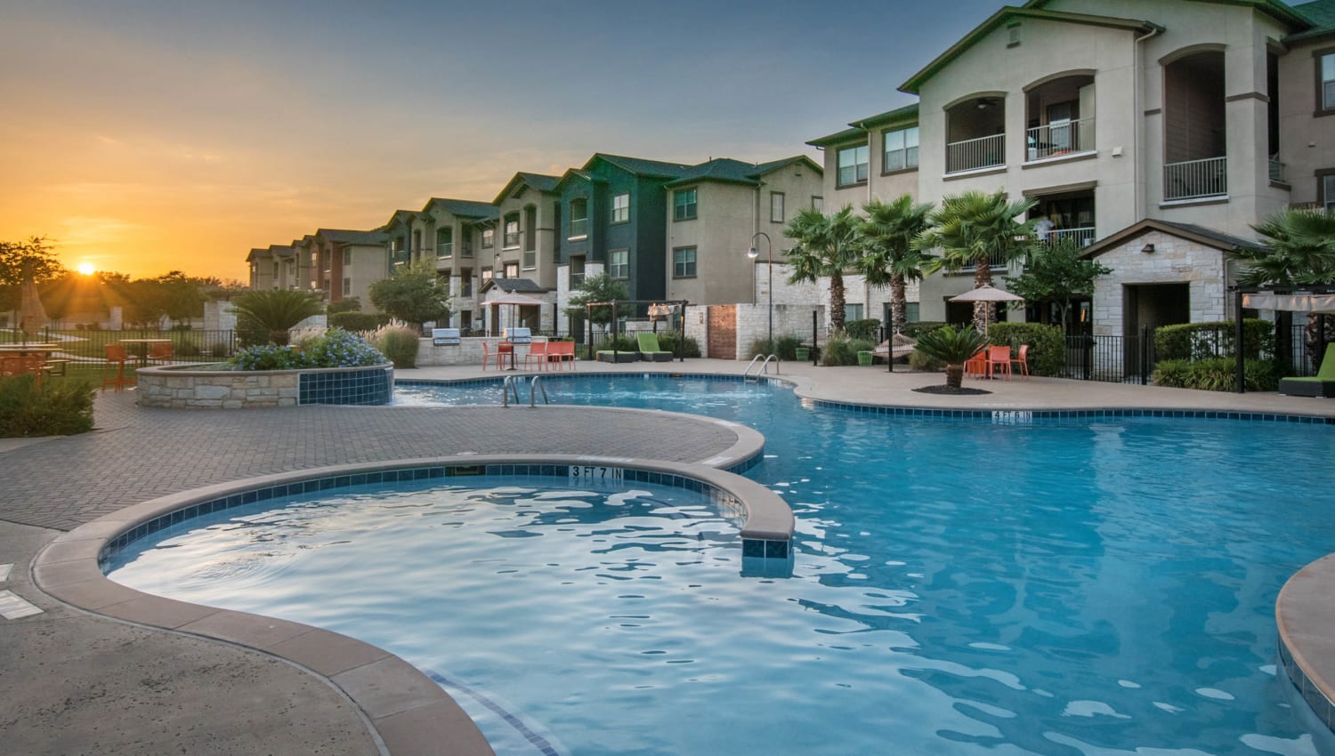 Peaceful sunrise from the swimming pool at Carrington Oaks in Buda, Texas