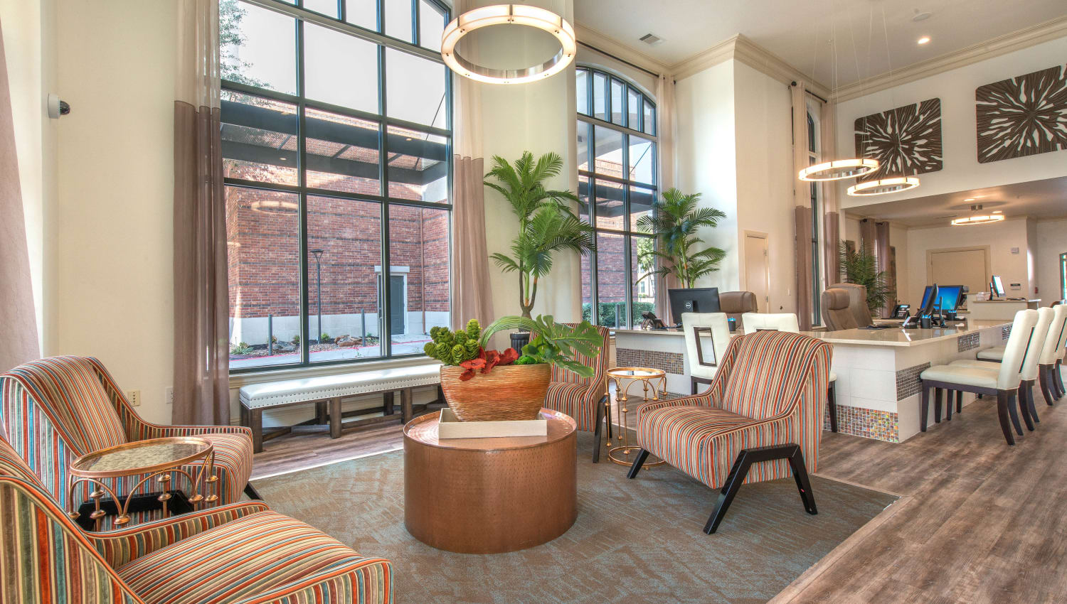 Lounge areas in the lobby at Olympus Las Colinas in Irving, Texas