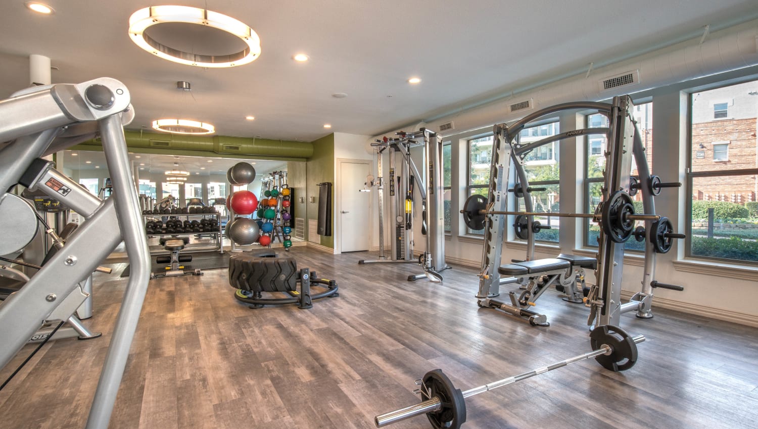 Ample equipment for everyone to stay in shape in the fitness center at Olympus Las Colinas in Irving, Texas