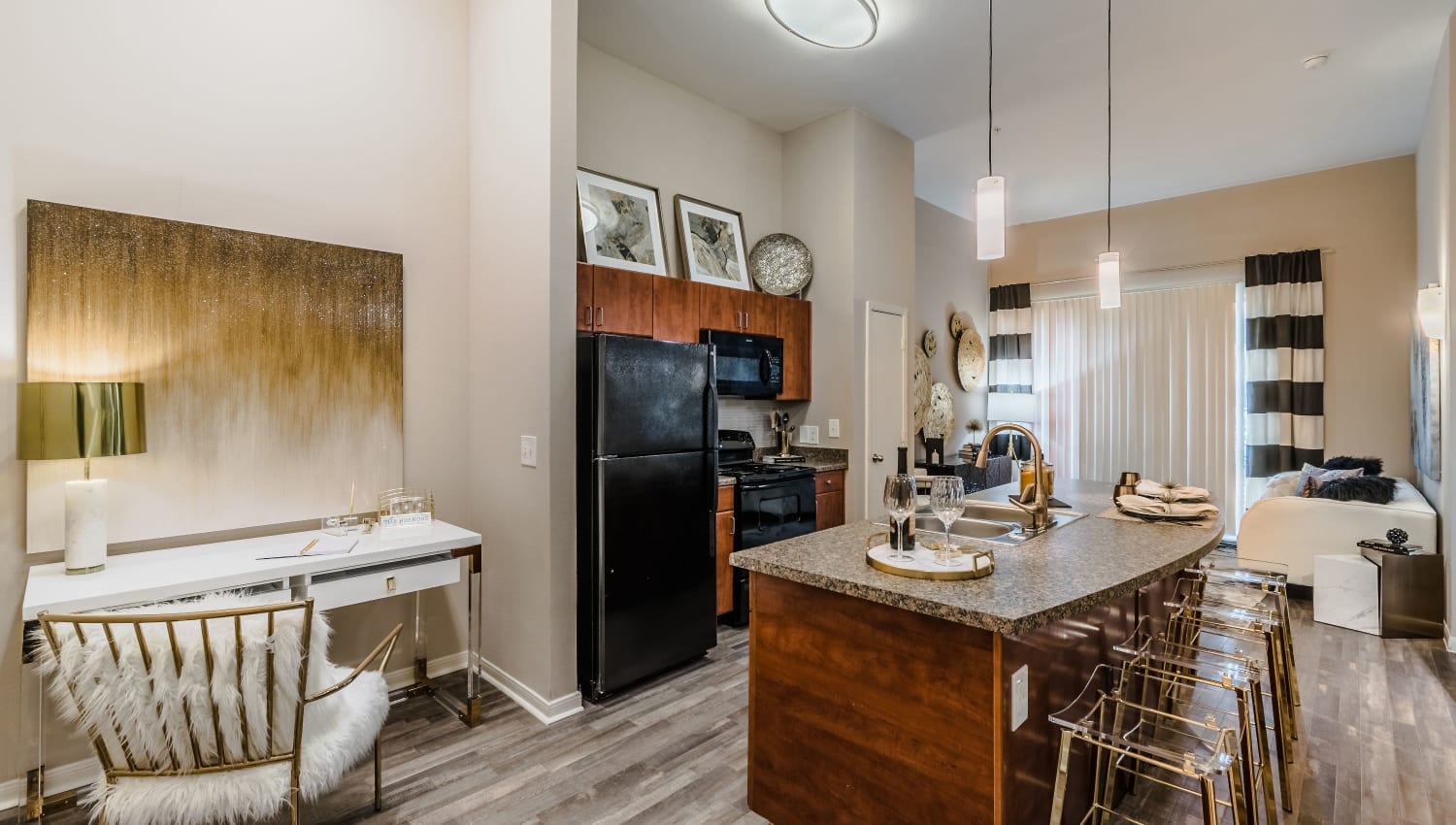 Gourmet kitchen with ample space at Olympus Boulevard in Frisco, Texas