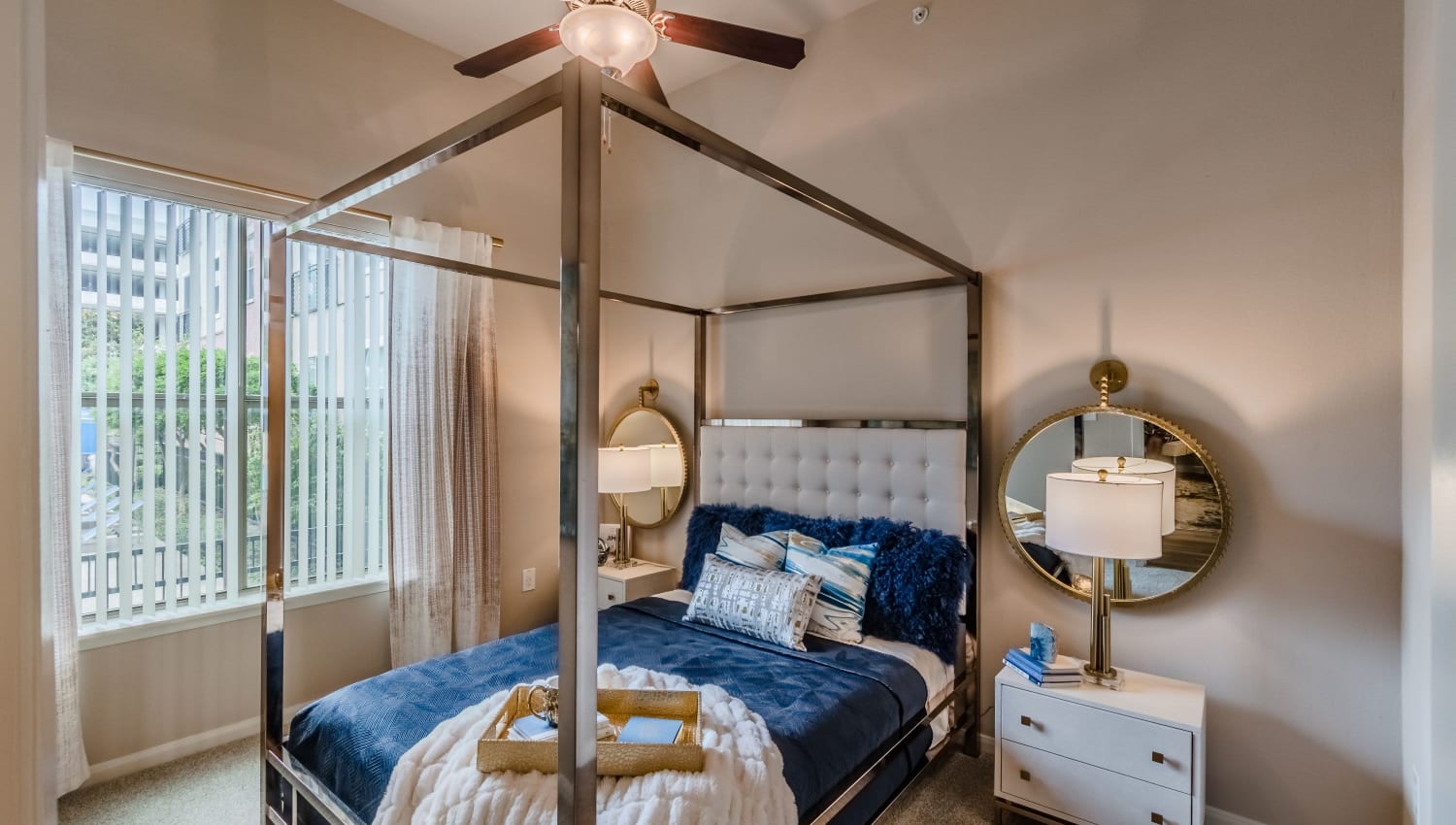 Well-lit bedroom at Olympus Boulevard in Frisco, Texas