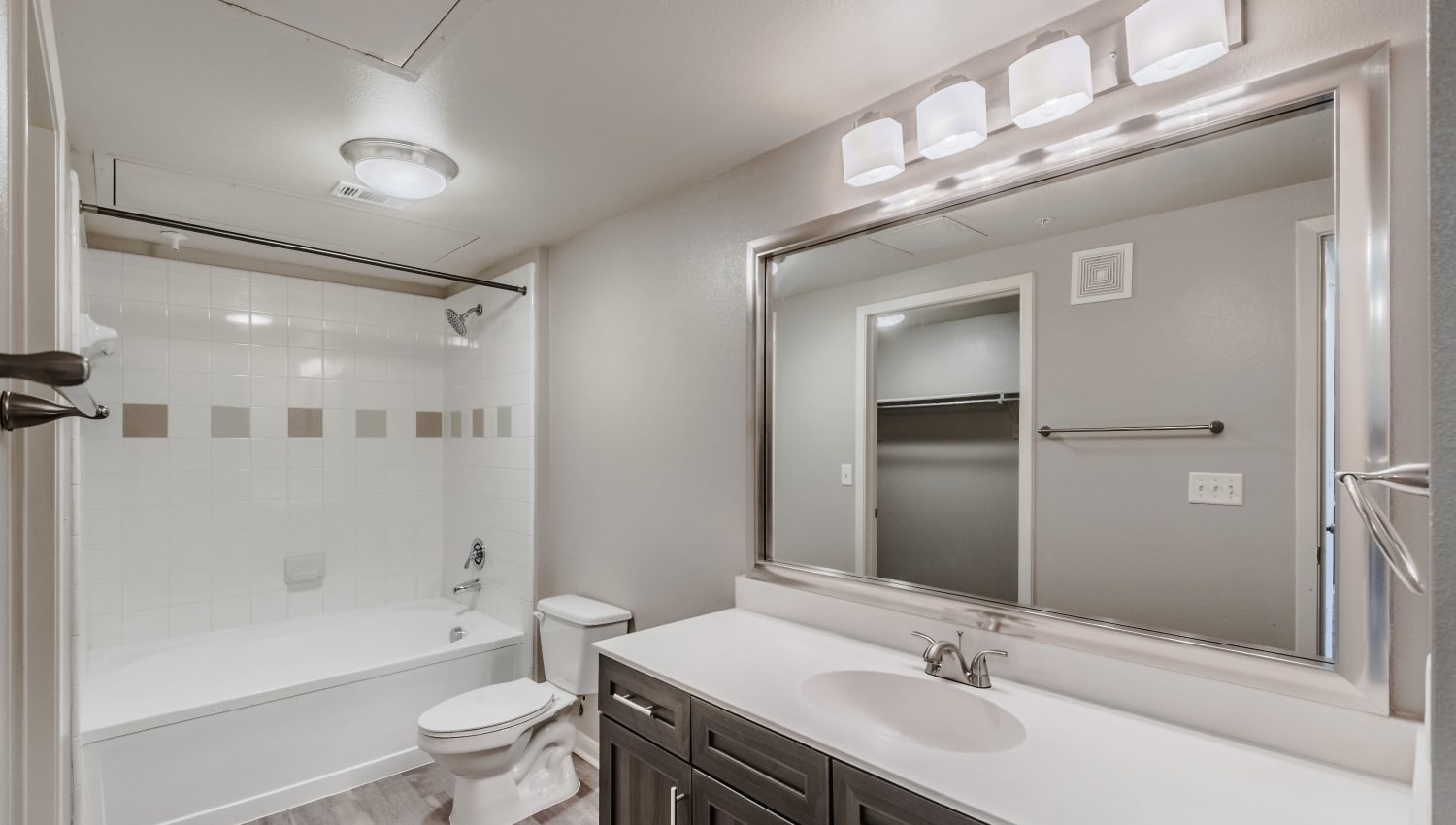 Shower and tub of model apartment at Olympus Boulevard in Frisco, Texas