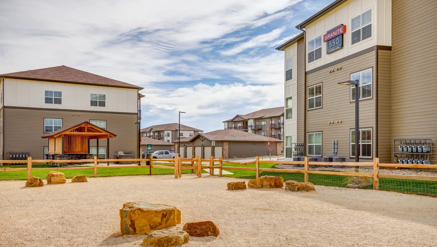Well-managed landscaping outside resident buildings at Granite 550 in Casper, Wyoming