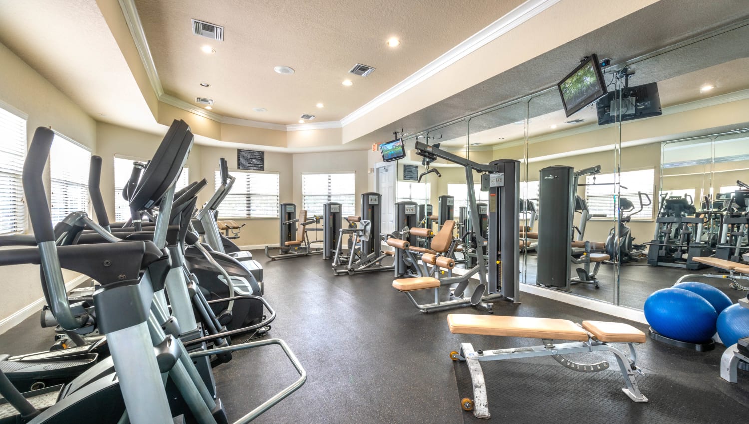 Very well-equipped fitness center at Mirador & Stovall at River City in Jacksonville, Florida