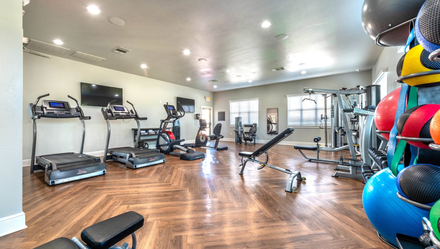 Well-equipped fitness center at Olympus Willow Park in Willow Park, Texas