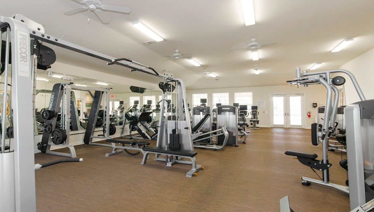 Ample equipment for everyone in the fitness center at Olympus Woodbridge in Sachse, Texas