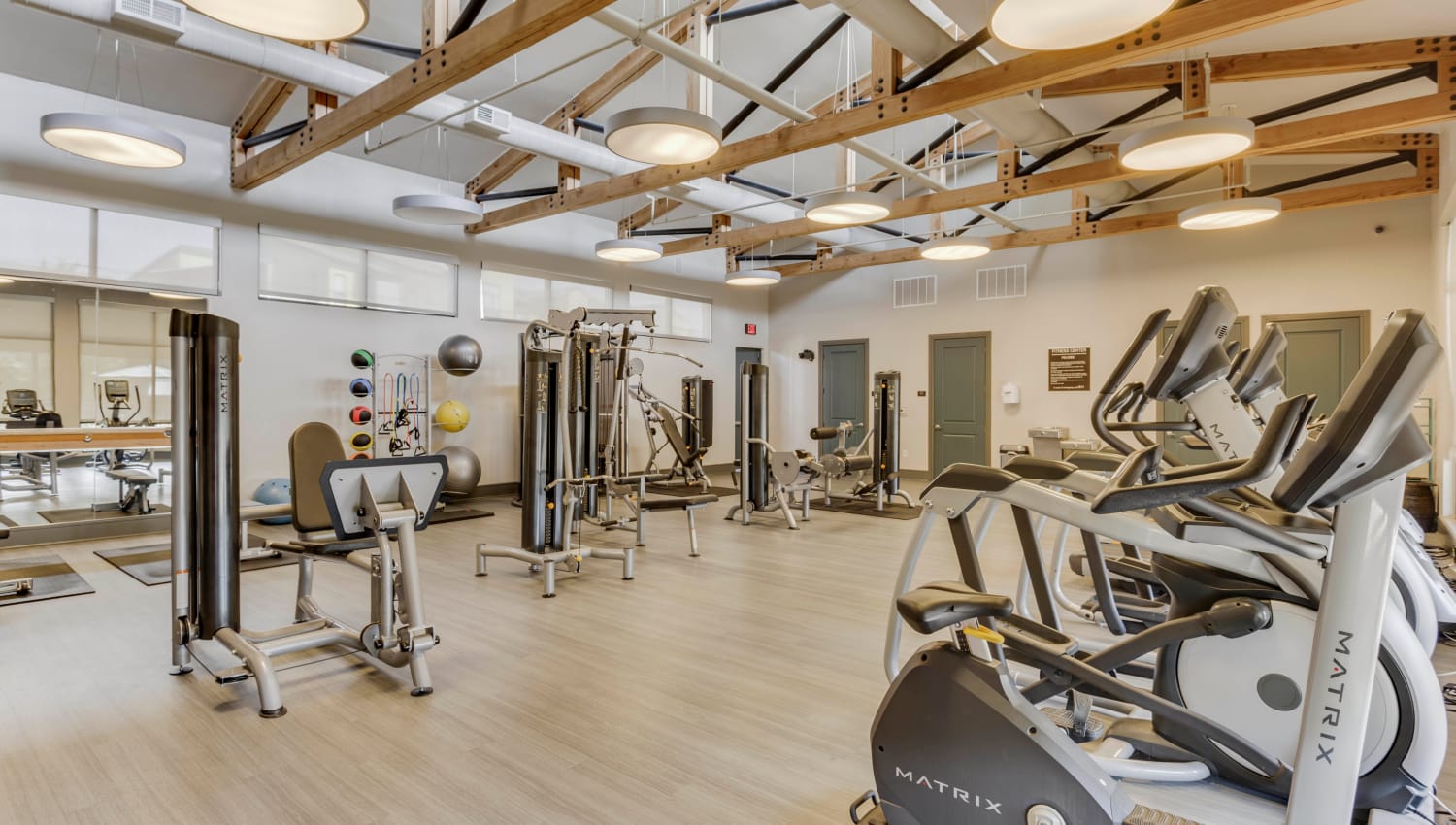 Well-equipped onsite fitness center at Tacara at Westover Hills in San Antonio, Texas