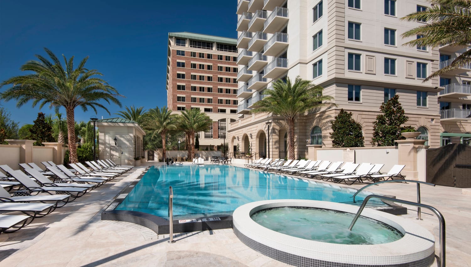 Resort-style swimming pool and spa at Olympus Harbour Island in Tampa, Florida