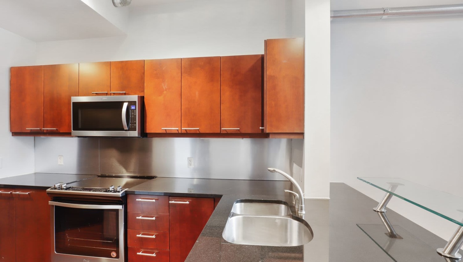 Kitchen with plenty of cabinet space at 17th Street Lofts in Atlanta, Georgia