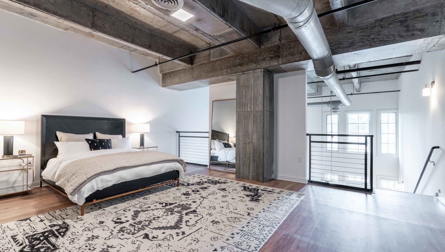 Huge bedroom with tons of space for activities at 17th Street Lofts in Atlanta, Georgia