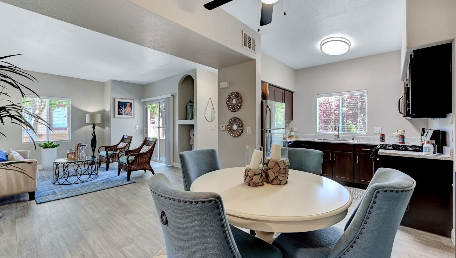 Dining area with view of kitchen and living room at Canyon Villas Apartments in Las Vegas, Nevada