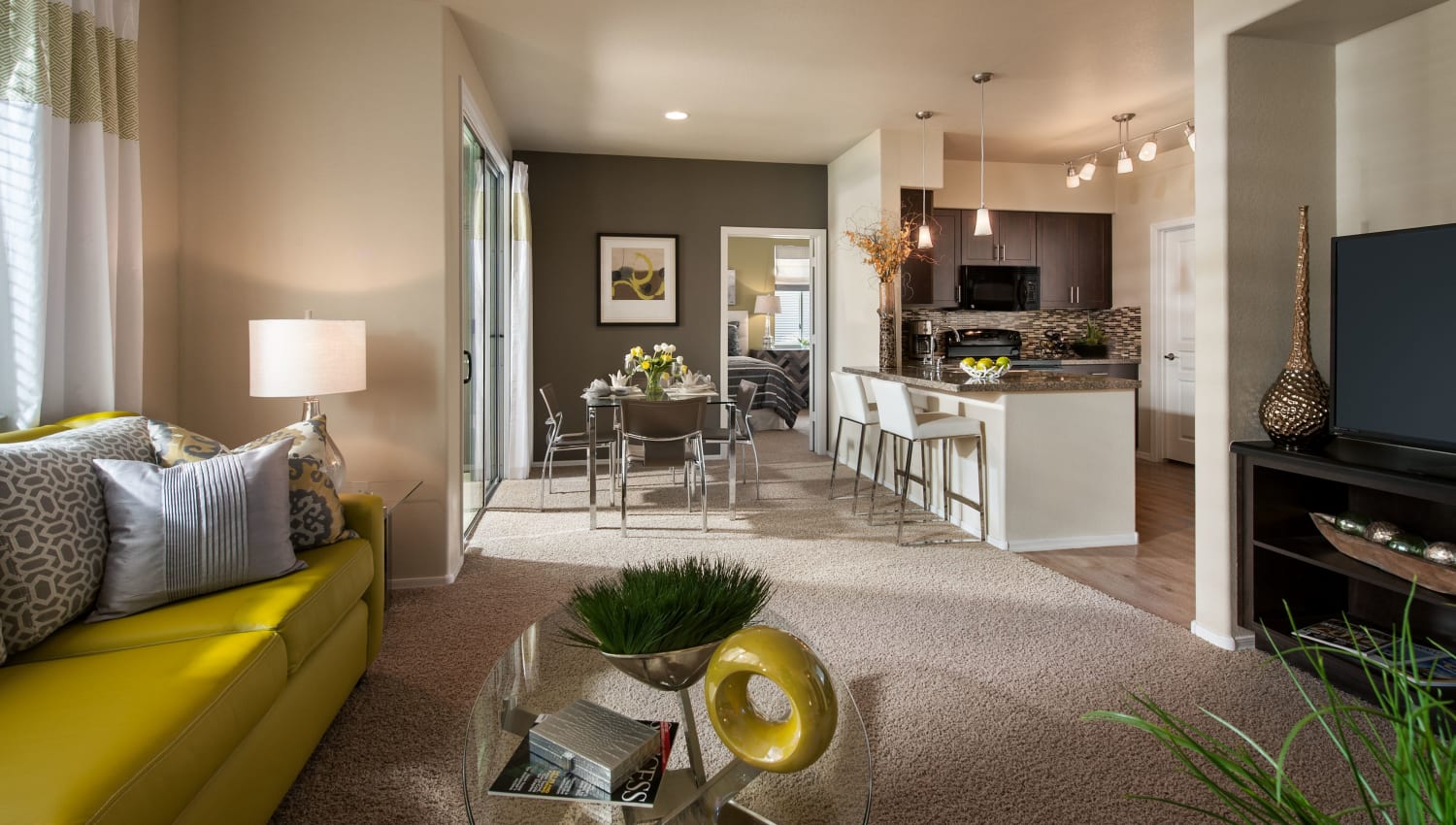 Model living room at Highland Groves at Morrison Ranch Apartments in Gilbert, Arizona