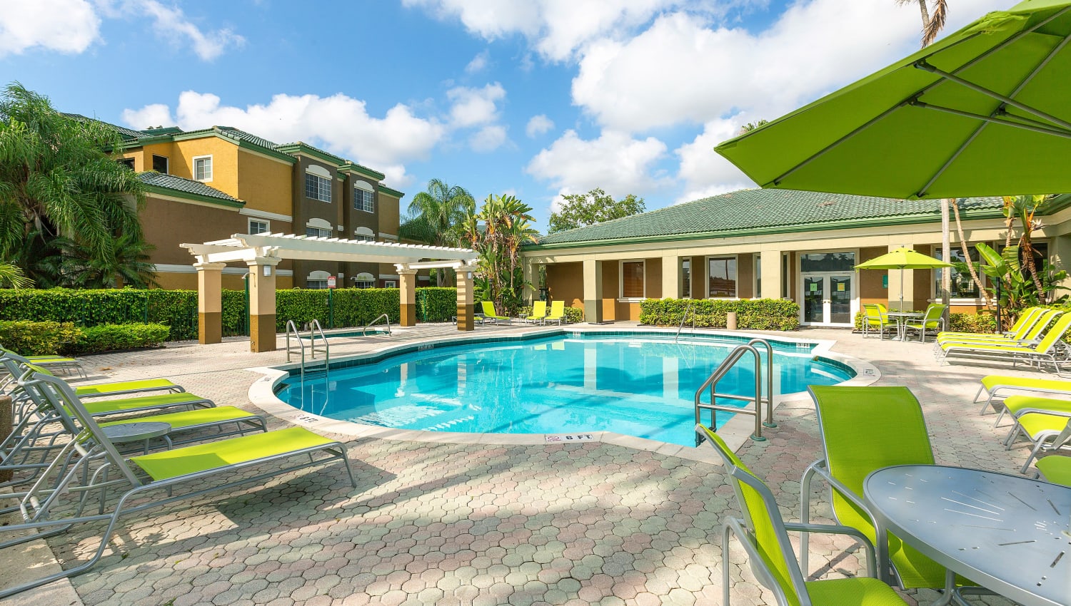 Sparkling pool at Club Lake Pointe Apartments in Coral Springs, Florida