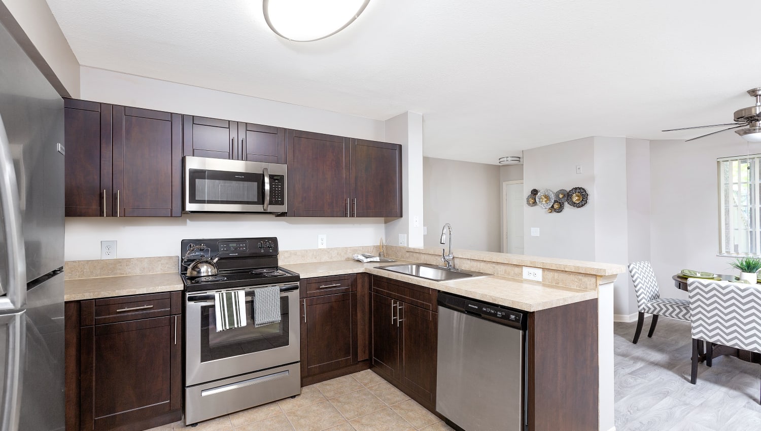 Model kitchen at Club Lake Pointe Apartments in Coral Springs, Florida