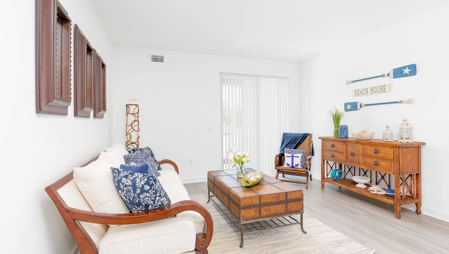 Model living room at Quantum Lake Villas Apartments in Boynton Beach, Florida
