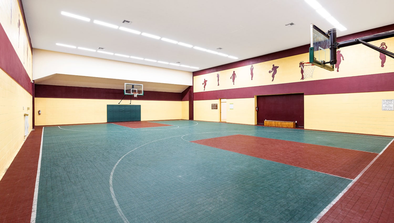 Indoor basketball court at Quantum Lake Villas Apartments in Boynton Beach, Florida