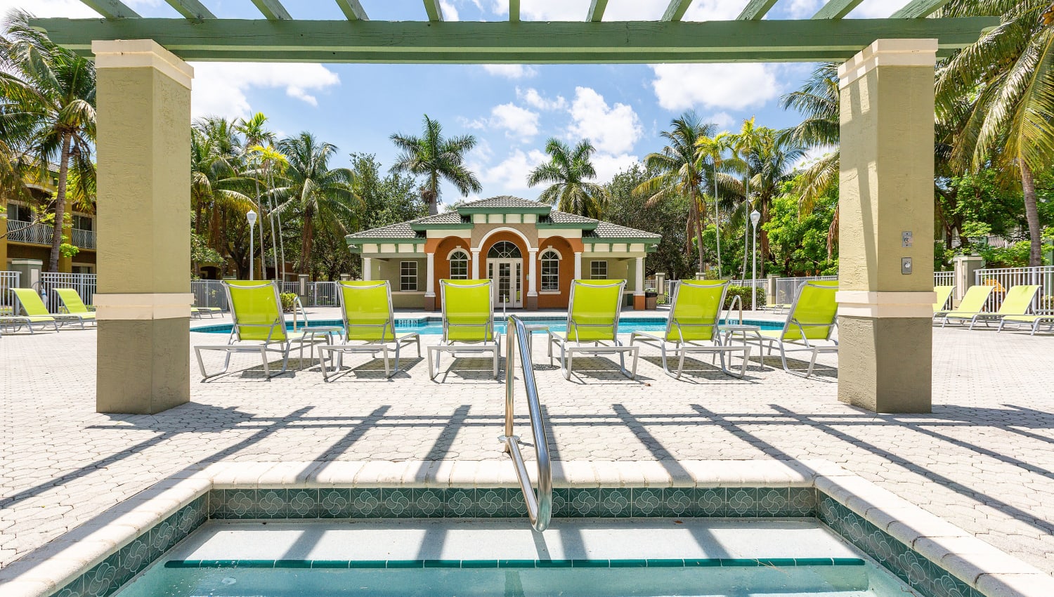 Pool and spa at Quantum Lake Villas Apartments in Boynton Beach, Florida