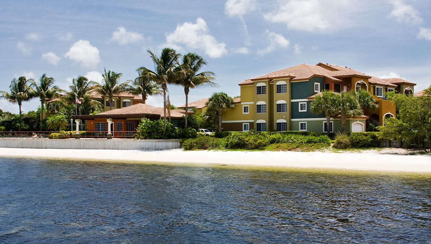 Exterior of Manatee Bay Apartments by the beach in Boynton Beach, Florida