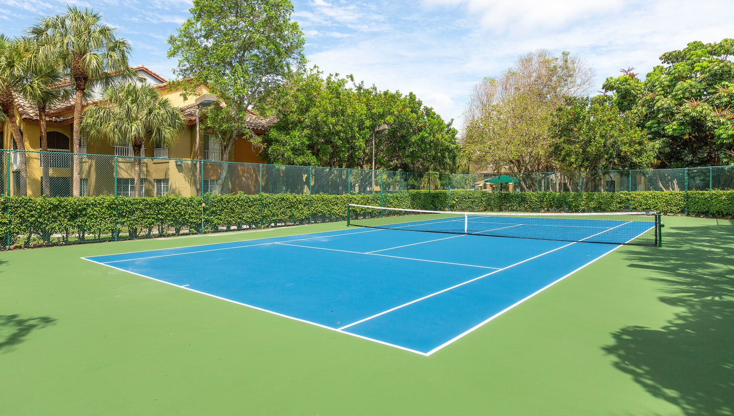 Tennis court at Mosaic Apartments in Coral Springs, Florida