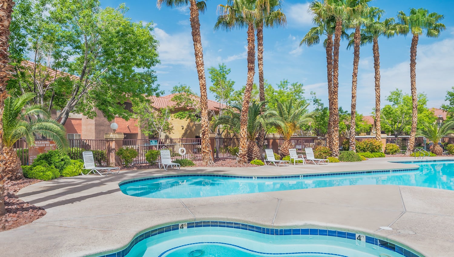 Sparkling pool and spa at Eagle Trace Apartments in Las Vegas, Nevada