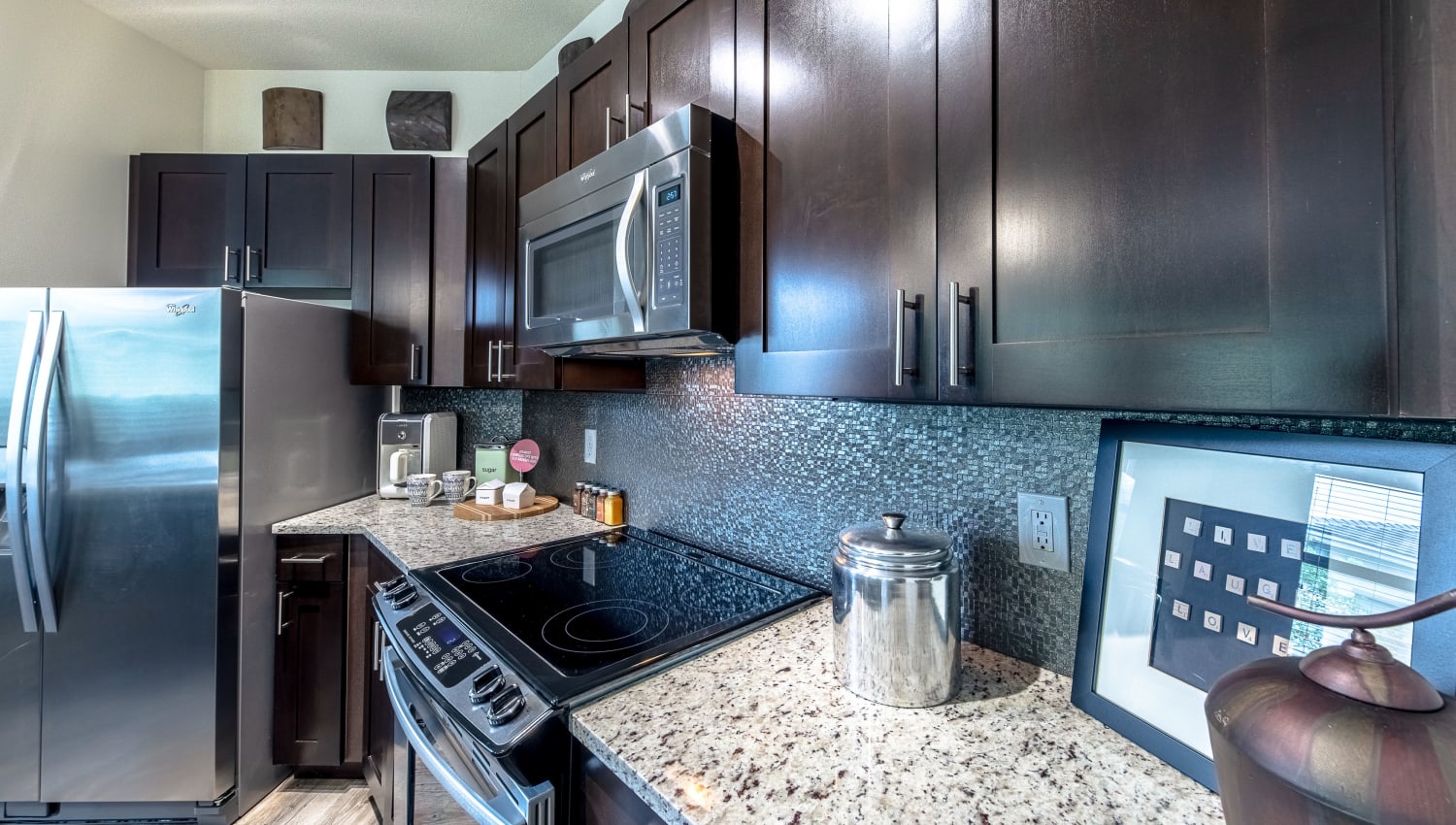 Model kitchen at The Hamptons at Palm Beach Gardens Apartments in Palm Beach Gardens, Florida