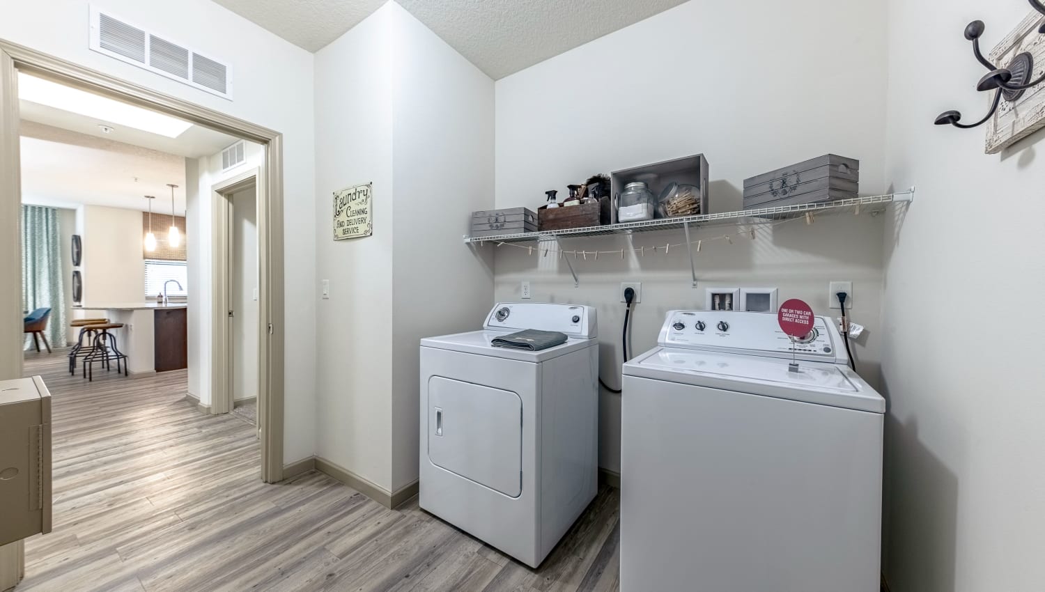 Washer and dryer at The Hamptons at Palm Beach Gardens Apartments in Palm Beach Gardens, Florida