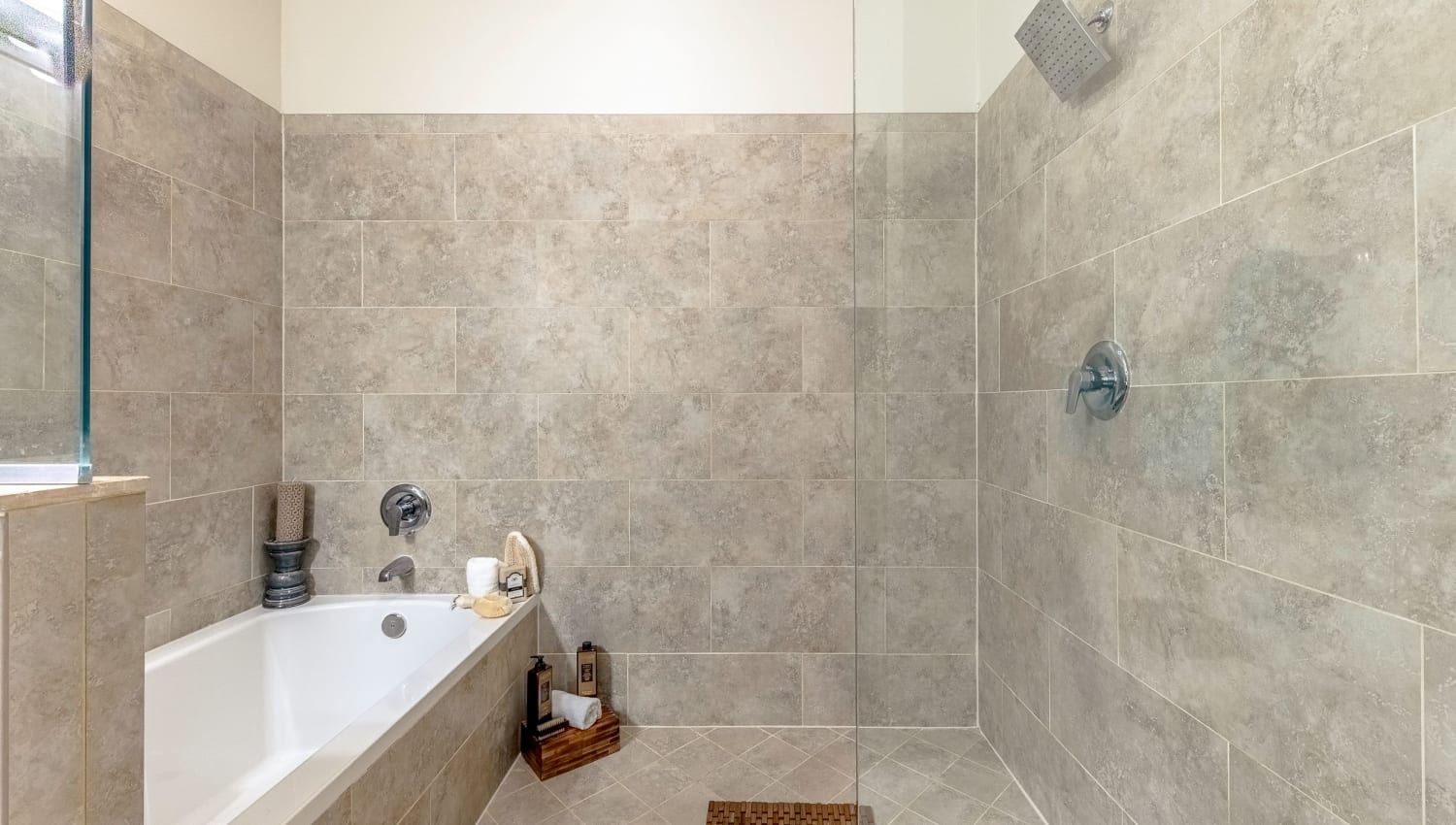 Large walk-in shower at The Hamptons at Palm Beach Gardens Apartments in Palm Beach Gardens, Florida