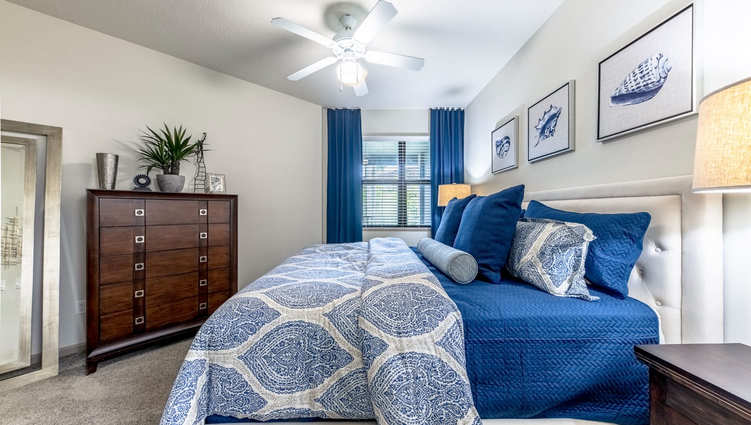 Model bedroom at The Hamptons at Palm Beach Gardens Apartments in Palm Beach Gardens, Florida