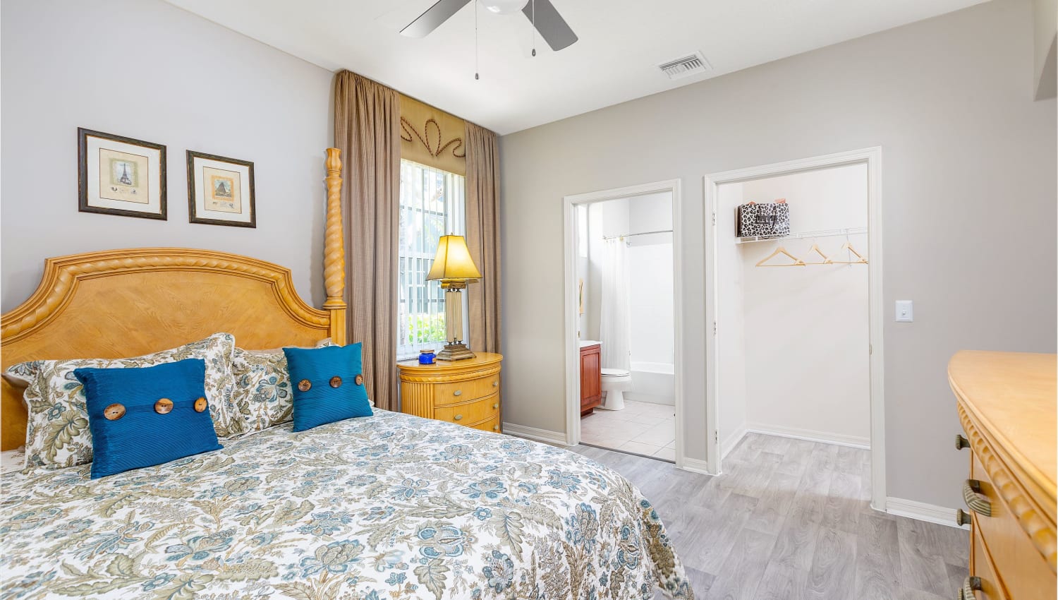 Model bedroom suite in apartment at Villas of Juno Apartments in Juno Beach, Florida