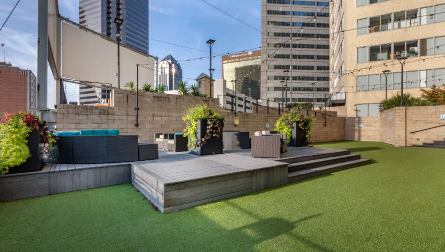 Seating and turf on the rooftop at Mosaic Dallas in Dallas, Texas