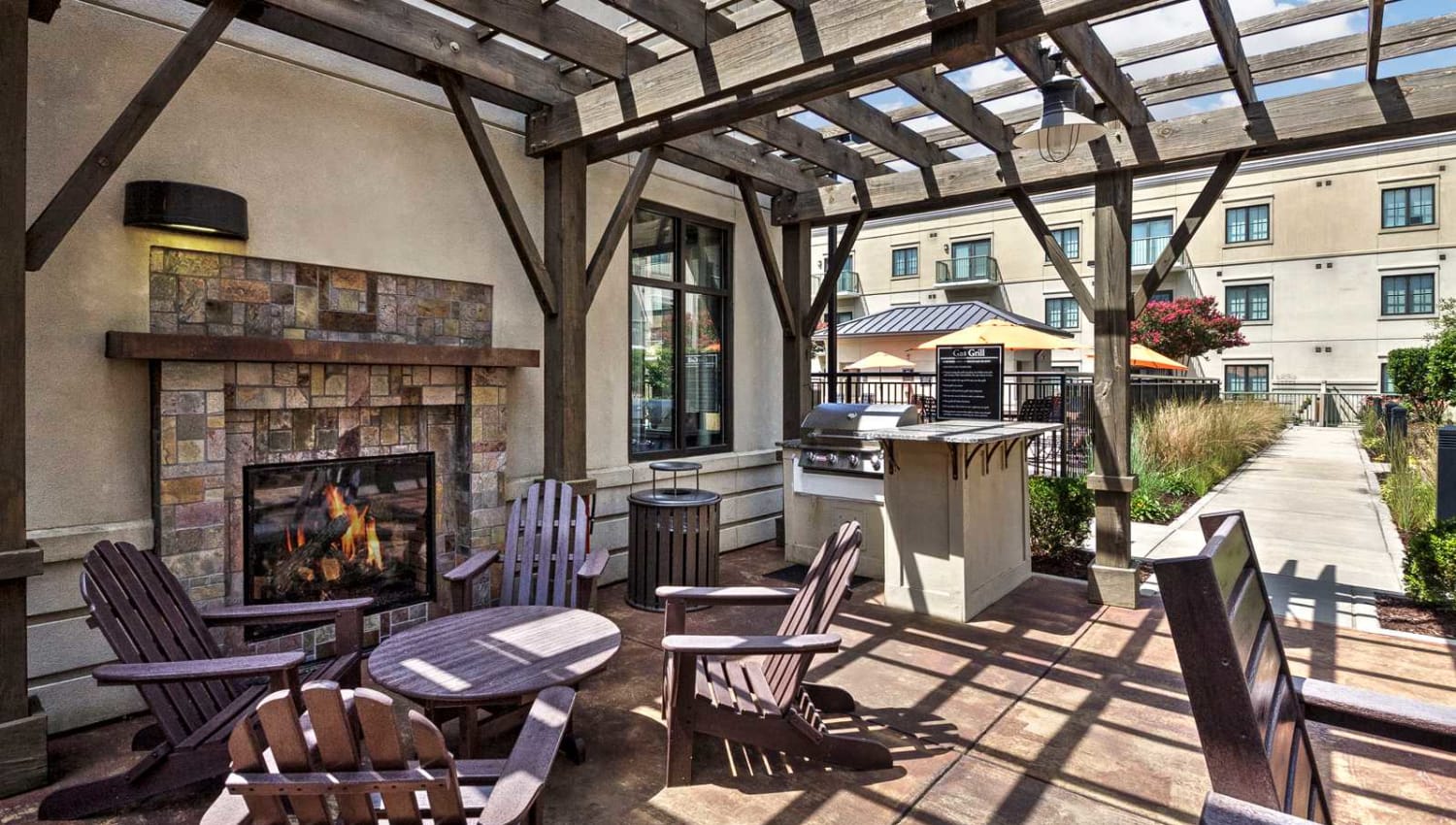 Outdoor fireplace and lounge area at SouthPark Morrison in Charlotte, North Carolina