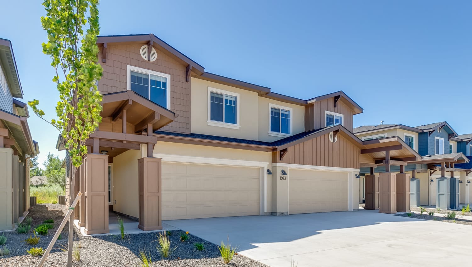 Townhome exterior at Olympus at Ten Mile in Meridian, Idaho