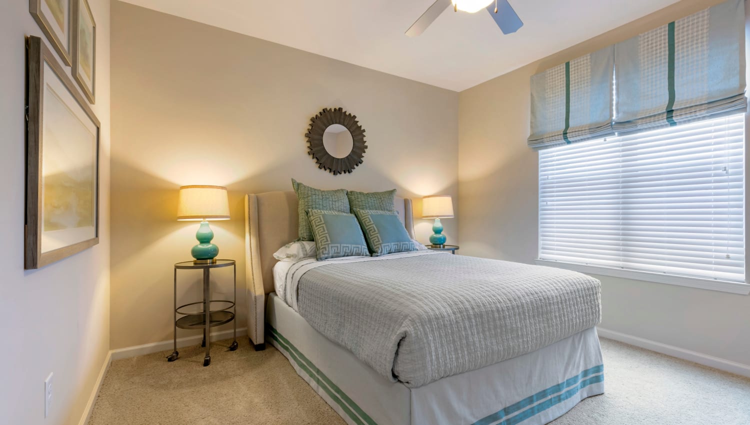 Model bedroom with great natural light at The Village at Apison Pike in Ooltewah, Tennessee